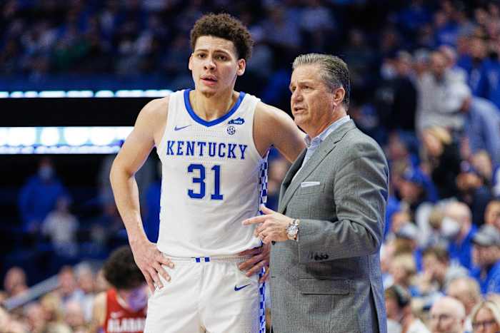 Kentucky Wildcats head coach John Calipari talks with Kentucky Wildcats guard Kellan Grady (31) during the second half against the Alabama Crimson Tide at Rupp Arena at Central Bank Center.